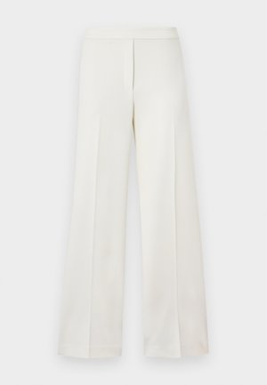 Άσπρο παντελόνι με ψηλή μέση και φαρδιά παντελόνα, με κρυφό φερμουάρ μπροστά και μινιμαλιστικό σχεδιασμό σε απλό φόντο.