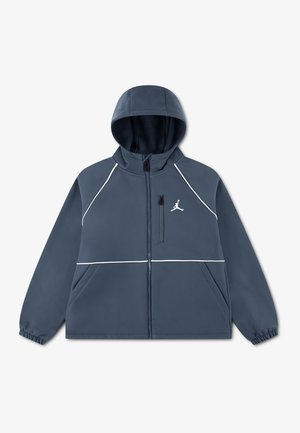Veste à capuche bleu foncé avec passepoil blanc, fermeture éclair frontale, poche poitrine, poignets élastiques et logo Jumpman blanc brodé sur la poitrine gauche.