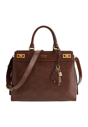 Brown textured leather Guess handbag with two handles, a shoulder strap, gold-tone hardware, and a hanging lock and key charm.