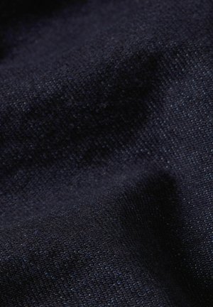 Dark navy blue woven fabric with a textured surface showing subtle folds and a slightly coarse weave pattern.