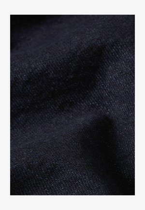 Dark navy blue woven fabric with a textured surface showing subtle folds and a slightly coarse weave pattern.