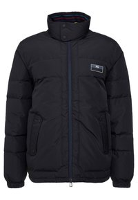 Veste matelassée noire avec col montant, fermeture éclair à l'avant, boutons-pression, poches latérales, poignets côtelés et doublure intérieure rayée.