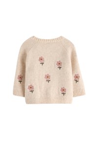 Beige strikket genser med raglanermer, prydet med broderte rosa blomster og grønne stilker, ribbestrikket kant og mansjetter. Myk tekstur.