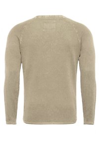Maglione a maniche lunghe, texturizzato, di un beige tenue, con colletto rotondo e polsini a costine, caratterizzato da un motivo a maglia simile a una rete.