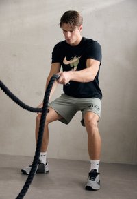 Nike Performance TEE SLUB - Camiseta deportiva - black