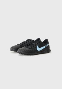 Black athletic shoes with textured surface, lightweight design, and blue Nike swoosh logo on the side. Rubber outsole for traction.