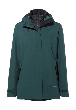 Giacca impermeabile teal con colletto alto, cappuccio regolabile e tasche con zip. Presenta una texture liscia e una foderatura nera a contrasto.