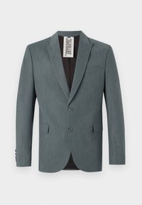 Grå, texturerad kavaj med slagkrage, två knappar fram och framfickor. Inuti är den mörkbrun med en synlig skötselrådsetikett.