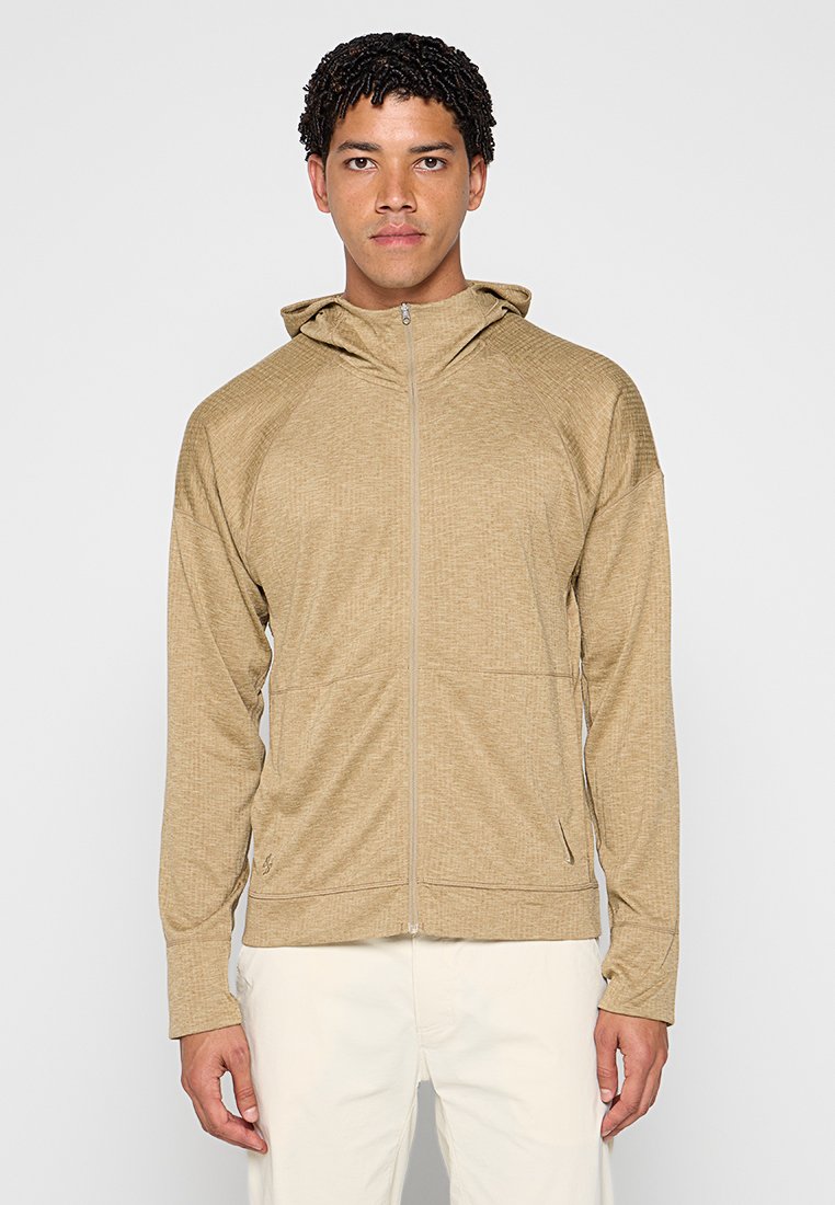 Felpa zip-up beige con finitura testurizzata, design aderente e cappuccio. Presenta tasche laterali e un sottile dettaglio con logo sull'orlo.