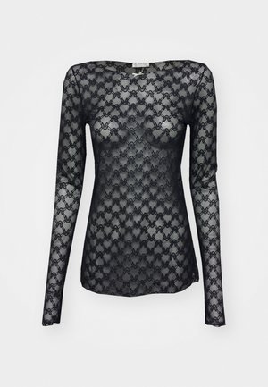 Black long-sleeve shirt made of lace, featuring a geometric pattern and a boat neckline. Sheer texture with a fitted silhouette.