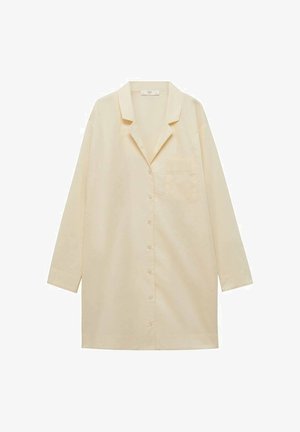 Svetlo rumena košulja na dugih rukavih s ovratnikom s izrezom, jednim džepom na prsima i glatkom pamučnom teksturom.