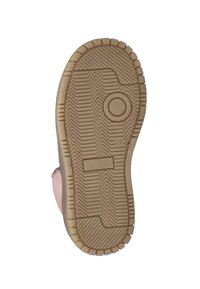 Zool van een schoen, met een gestructureerd rubberen oppervlak voorzien van een zigzagpatroon en cirkelvormige details. De kleur is lichtbruin met lichtere tramlijnen.