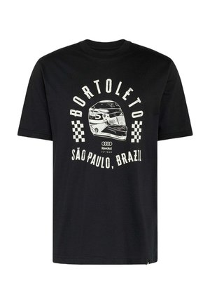 Camiseta negra con gráfico de casco de carreras blanco, banderas a cuadros y texto "Bortoleto São Paulo, Brasil" con los logotipos de Audi y Revolut.