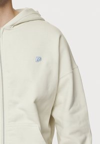 Pegador Sudadera con cremallera - off-white