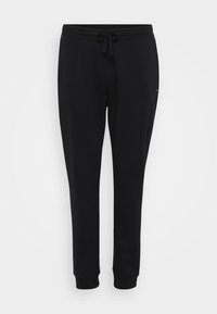 Zwarte sweatpants met een trekkoord in de taille, taps toelopende benen en ribbelboorden. Gemaakt van zachte katoen met een gladde textuur.