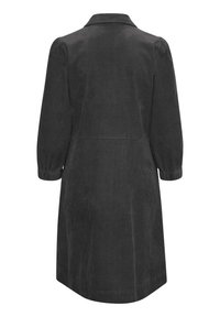 Schwarzes Cordkleid mit kragenförmigem Ausschnitt, langen Puffärmeln und taillierter Passform, mit vertikaler Rippstruktur und knielangem Rock.