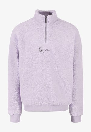 Svetlo vijoličen flis pulover z visokim ovratnikom, pol-zadrgo in vezenim logotipom na prsih. Ima rebraste manšete in spodnji del.