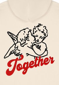 Felpa crema con cherubini neri ricamati e la parola "Insieme" in bold rosso, evidenziando dettagli intricati e una texture morbida.