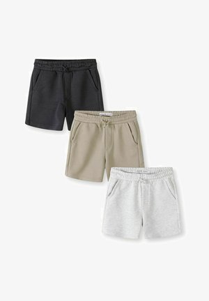 Tre par afslappede shorts med elastisk talje i sort, beige og lysegrå, vist fladt med forlommer og snørredetaljer.
