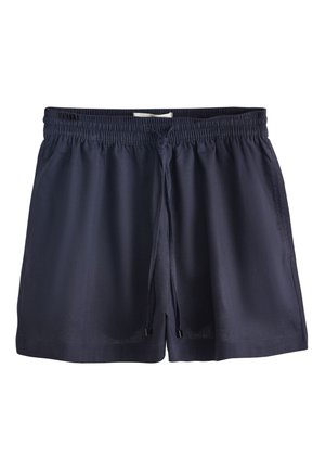 Navyblå elastiske shorts med snøre foran, lavet af letvægtsstof, vist fladt på en hvid baggrund.