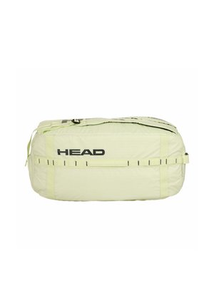 Lichtgroene rechthoekige sporttas met zwart "HEAD" logo en meerdere banden, liggend plat met een gedeeltelijk open rits.