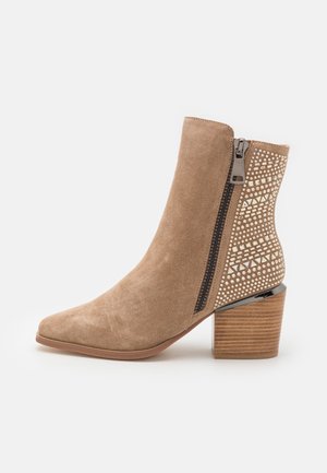 Alma en Pena, Bottines - sand