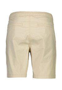Short beige longueur genou avec une ceinture élastique et deux poches passepoilées à l’arrière.