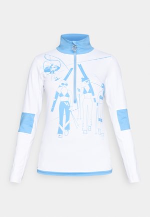 Valkoinen pitkähihaisen vetoketjullinen paita, jossa on vaaleansiniset yksityiskohdat ja lasketteluteemainen grafiikka, jossa on hiihtäjiä. Materiaali näyttää sileältä ja siinä on pehmeä kaulus.