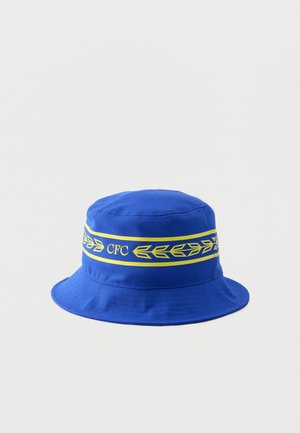 Blauer Fischerhut mit gelbem Band mit der Aufschrift "CFC" und einem Lorbeerblattrand um die Krone.