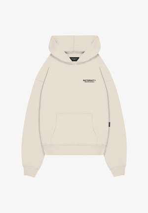 Hoodie in cremfarbener Farbe aus weichem Material, mit einer Vordertasche, gerippten Bündchen und einem minimalistischen schwarzen Logo auf der Brust.