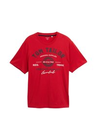 Rode katoen T-shirt met een ronde hals en korte mouwen. Het ontwerp aan de voorkant bevat zwarte tekst en een ronde grafiek met "sinds 1962."