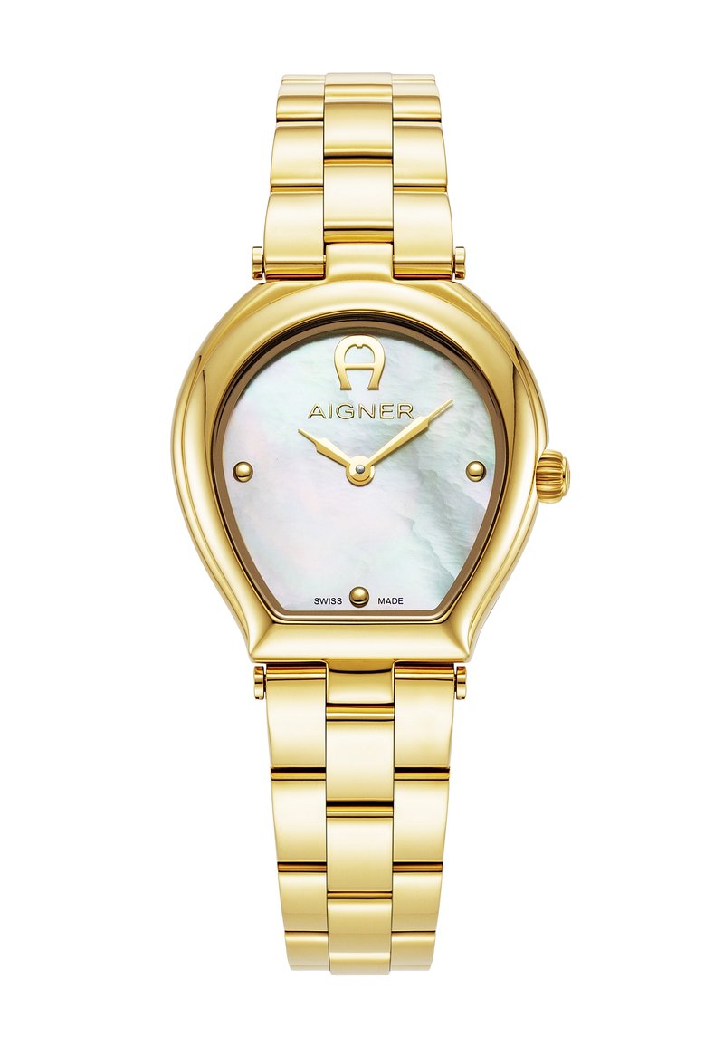 Reloj metálico dorado con caja ovalada, dial de nácar y manecillas doradas. Presenta una pulsera de eslabones dorada y el logo de Aigner a las 12 en punto.