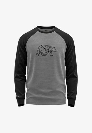 Maglia a maniche lunghe con corpo grigio e maniche nere. Presenta una grafica geometrica di un orso nera sul davanti. Tessuto con una consistenza liscia.