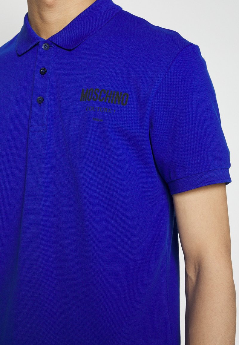 Herren T-shirts & Polos | MOSCHINO UPPER BODY GARMENT Poloshirt blue/hellblau - SZ15129 Herren T-shirts & Polos | MOSCHINO UPPER BODY GARMENT Poloshirt blue/hellblau - SZ15129