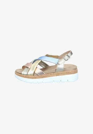 Women’s wedge sandal with multicolor metallic leather straps, adjustable buckle, cork midsole, and white rubber outsole.