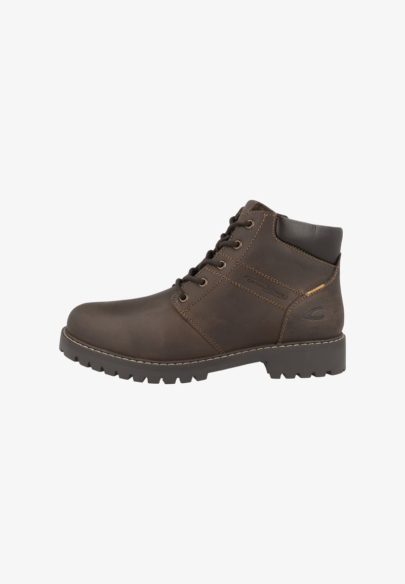 Botte chelsea en cuir marron avec un design à lacets, surface texturée, coutures contrastées et semelle en caoutchouc robuste. Présente un branding subtil.