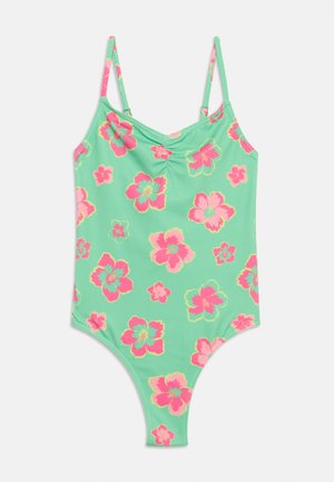 Costume intero verde menta con motivo floreale rosa e giallo e sottili spalline regolabili.