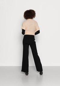 Twist & Tango SLOANE TROUSERS - Calças de fato de treino - black