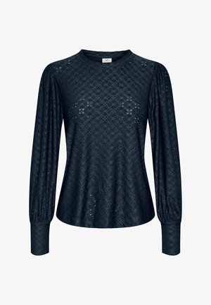 La blouse bleu marine à manches longues présente un motif texturé, avec un col rond et des poignets froncés, fabriquée en tissu léger.