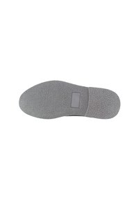 Suela gris de un zapato con una superficie texturada y una lengüeta rectangular, diseñada para ofrecer agarre y estabilidad. Forma plana y redondeada.