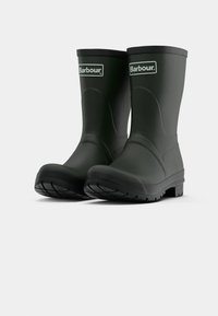 Bottes en caoutchouc vertes et imperméables avec un design structuré, des semelles noires texturées et un logo Barbour à l'avant.