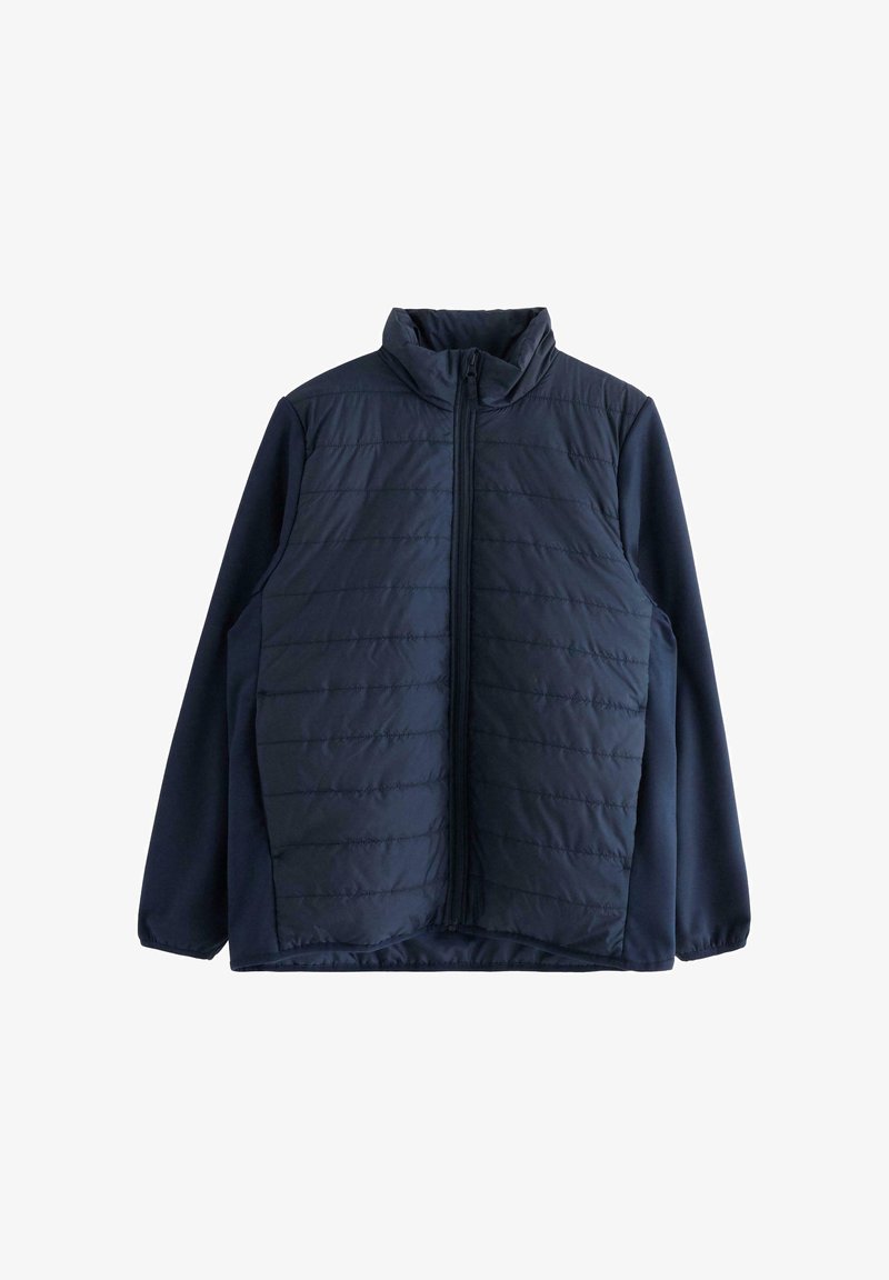 Giacca imbottita blu navy con colletto alto, chiusura frontale con zip, motivo trapuntato sulla parte superiore anteriore e tessuto solido sulle maniche.