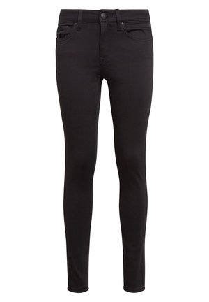 Jeans skinny noirs en tissu extensible, dotés d'une fermeture à bouton à l'avant, de passants de ceinture et d'un design à cinq poches avec des coutures subtiles.
