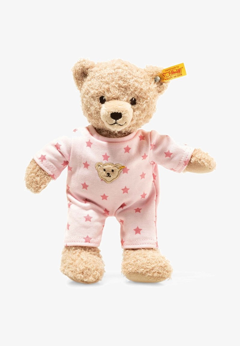 Stuffed bear with fuzzy tan fur, wearing a pink pajama with white stars and a bear logo. Has a soft, stitched nose and black eyes.