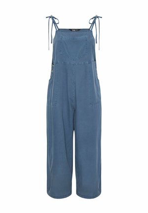 Niebieski bawełniany kombinezon bez rękawów z przednią kieszenią, wiązanymi na kokardę ramiączkami i szerokimi, skróconymi nogawkami.