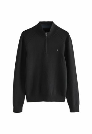 Mustmust tokkidega must pullover, millel on pool-äkk kaelus, ribitud varrukad ja diskrreetne logo rinnal. Valmistatud pehmest, tekstuuriga kangast.