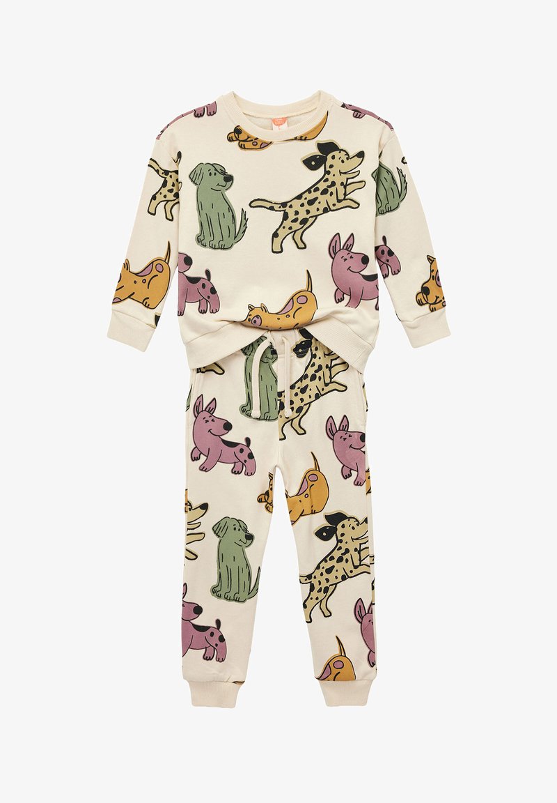 Zweiteiliges Kinder-Pyjama-Set mit einer cremefarbenen Basis und bunten Cartoon-Hundemustern. Der Sweatshirt hat lange Ärmel; die Hose hat einen elastischen Bund.