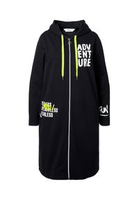 Black hooded long zip-up jacket with neon yellow drawstrings, white and yellow text prints reading "ADVENTURE", "FEARLESS", and "FUN".