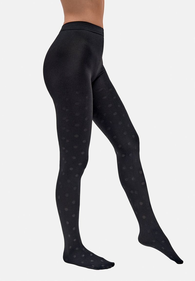Tights negros opacos con un patrón de puntos, con una textura suave y un diseño de cintura alta que se extiende hasta el tobillo.