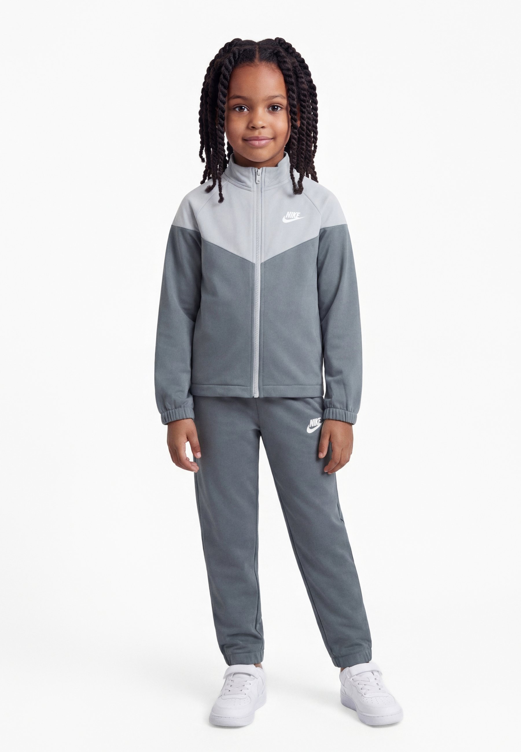 grey and white nike jogging suit